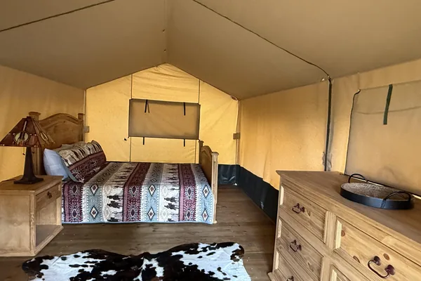 Glamping interior with ranch linens